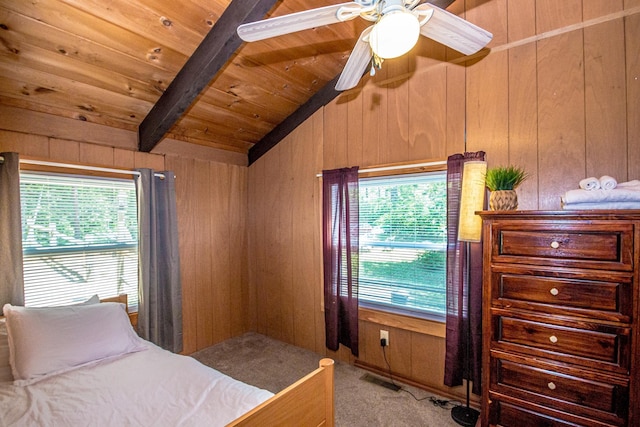 25 Singer Ln, Conway, NH 03813 - bedroom featuring multiple windows, light colored carpet, wood walls, wooden ceiling, and a ceiling fan