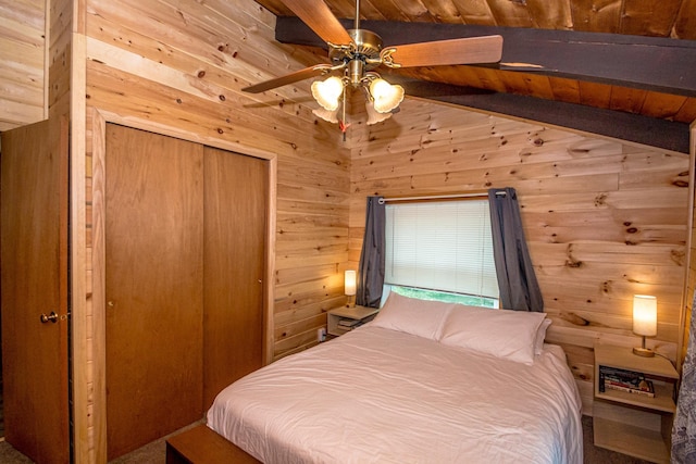 25 Singer Ln, Conway, NH 03813 - bedroom featuring wooden walls, a closet, a wooden ceiling with exposed beams, and ceiling fan