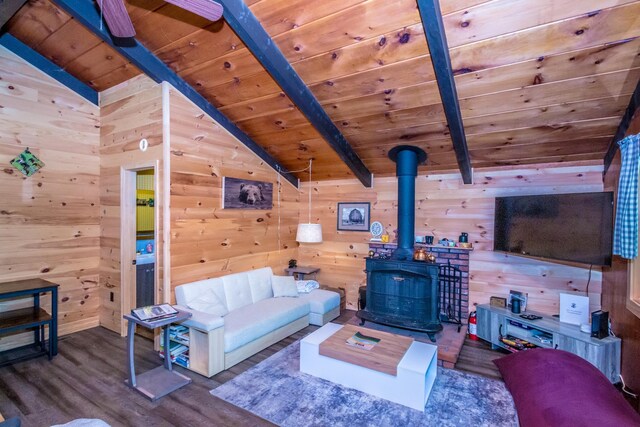 25 Singer Ln, Conway, NH 03813 - living room featuring wooden ceiling, wood finished floors, wooden walls, and a wood stove