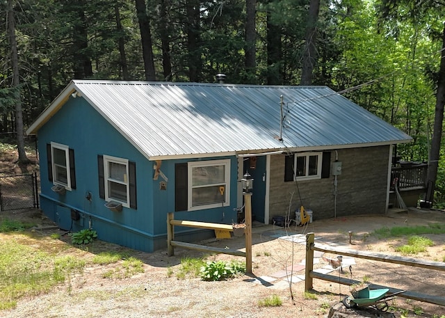 25 Singer Ln, Conway, NH 03813 - rustic home featuring a metal roof