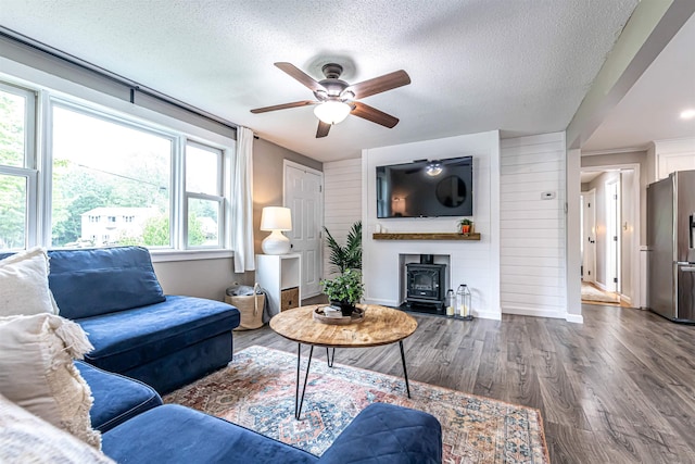 71/2 Olesen Rd, Derry, NH 03038 - living area featuring a ceiling fan, a textured ceiling, and wood finished floors