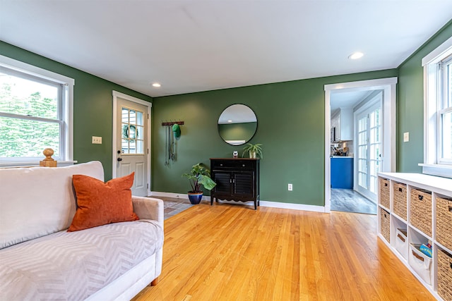 71/2 Olesen Rd, Derry, NH 03038 - living room with light wood-style floors, plenty of natural light, and recessed lighting