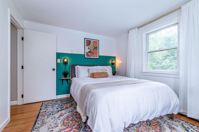 71/2 Olesen Rd, Derry, NH 03038 - bedroom with light wood-style flooring and baseboards