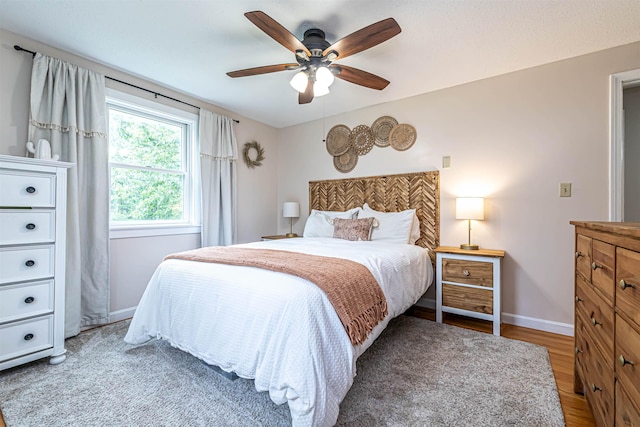 71/2 Olesen Rd, Derry, NH 03038 - bedroom featuring wood finished floors and ceiling fan