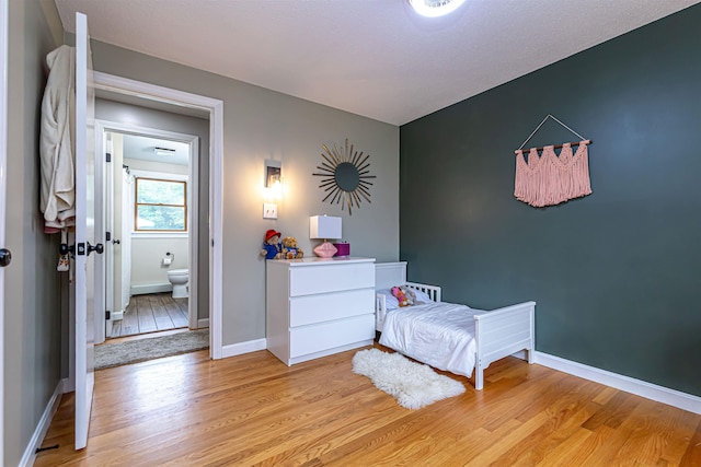 71/2 Olesen Rd, Derry, NH 03038 - bedroom with light wood-style flooring and baseboards