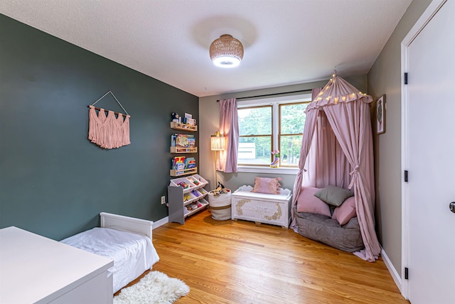 71/2 Olesen Rd, Derry, NH 03038 - bedroom featuring light wood finished floors and baseboards