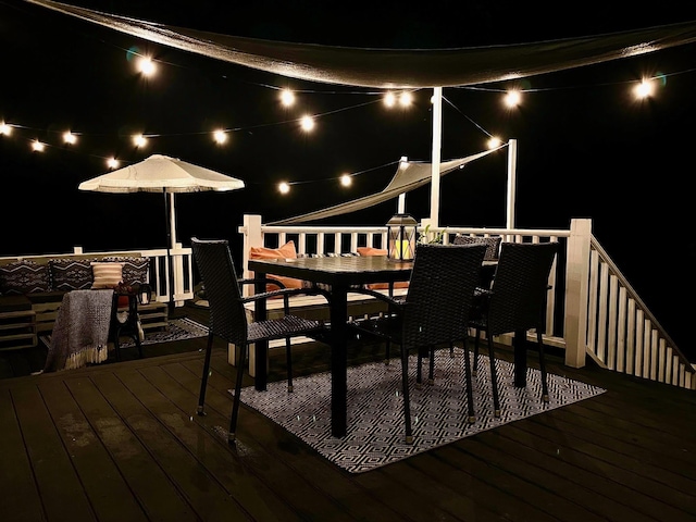 71/2 Olesen Rd, Derry, NH 03038 - deck at twilight with outdoor dining space