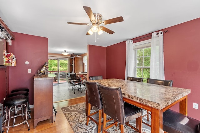 245 W River Rd, Hooksett, NH 03106 - dining room featuring a ceiling fan and wood finished floors