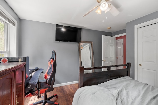 245 W River Rd, Hooksett, NH 03106 - bedroom featuring wood finished floors, a desk, and a ceiling fan