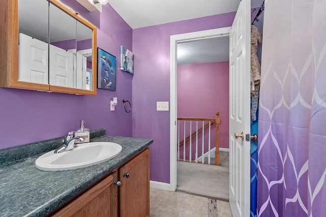 245 W River Rd, Hooksett, NH 03106 - bathroom featuring vanity and tile patterned floors