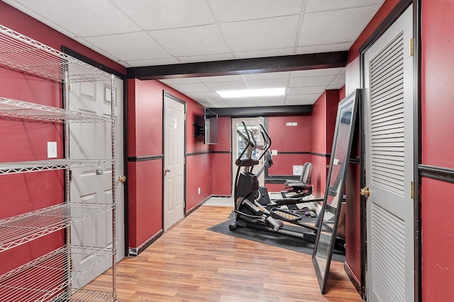 245 W River Rd, Hooksett, NH 03106 - workout area with a drop ceiling and light wood-type flooring