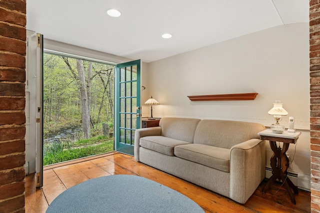 85 Dartmouth College Hwy Unit 204, Lyme, NH 03768 - living room with hardwood / wood-style floors, recessed lighting, and baseboard heating