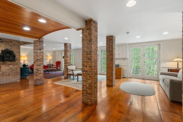 85 Dartmouth College Hwy Unit 204, Lyme, NH 03768 - living room featuring ornate columns, wood-type flooring, recessed lighting, and french doors