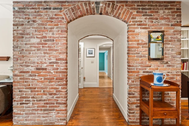 85 Dartmouth College Hwy Unit 204, Lyme, NH 03768 - corridor with arched walkways and wood finished floors