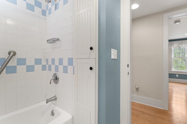 85 Dartmouth College Hwy Unit 204, Lyme, NH 03768 - full bathroom with wood finished floors and bathing tub / shower combination