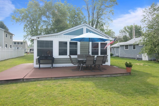 174 Kirk And Fitts Rd, Alburgh, VT 05440 - rear view of property featuring a deck, a yard, and outdoor dining area