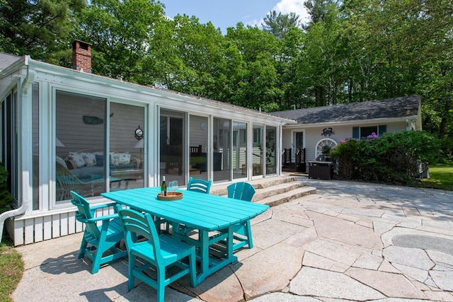 496 Coles Hill Rd, Wells, ME 04090 - view of patio featuring a sunroom and outdoor dining space