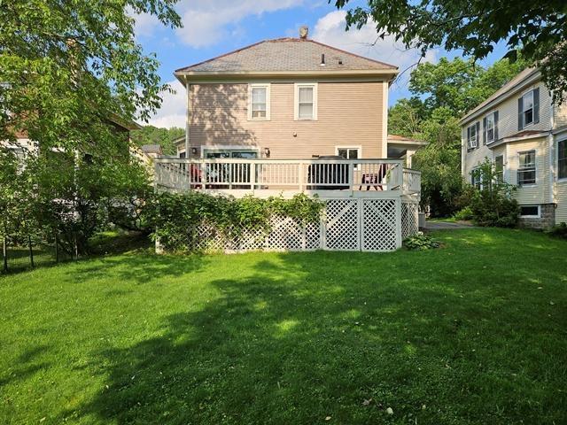 93 S Lincoln St, Keene, NH 03431 - rear view of property with a yard and a deck