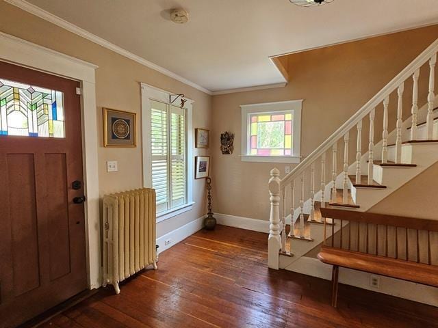 93 S Lincoln St, Keene, NH 03431 - foyer with radiator, dark wood-type flooring, plenty of natural light, stairs, and crown molding