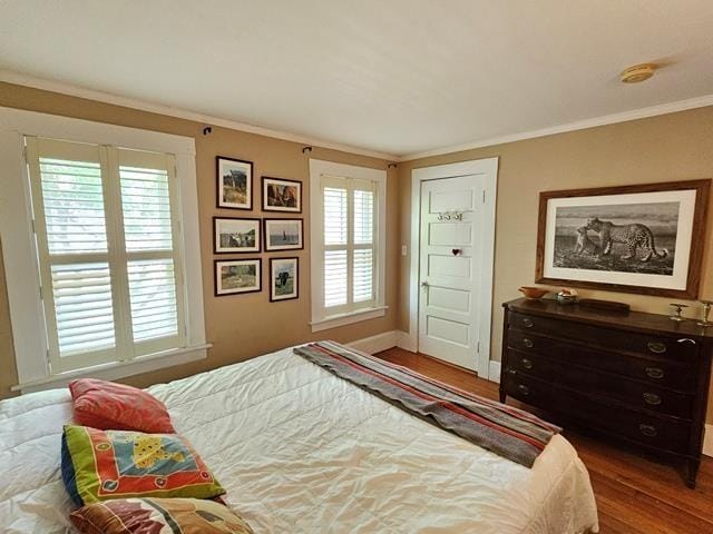 93 S Lincoln St, Keene, NH 03431 - bedroom featuring wood finished floors, multiple windows, and ornamental molding