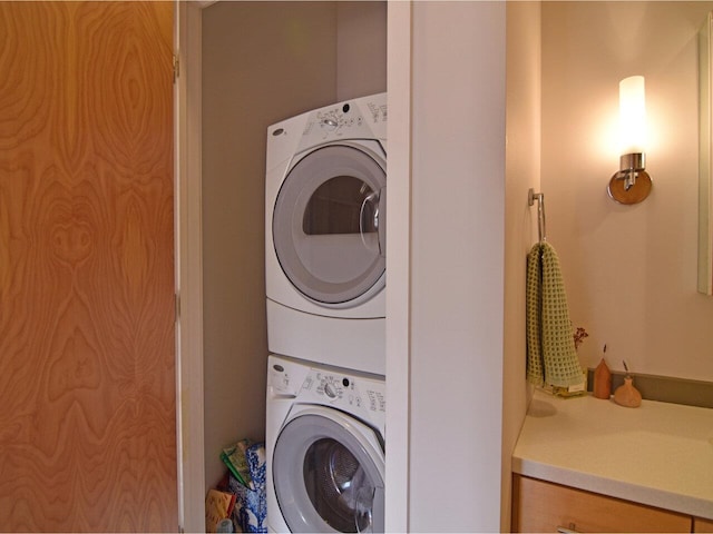 161 St Paul St Unit 202, Burlington, VT 05401 - washroom with stacked washing machine and dryer