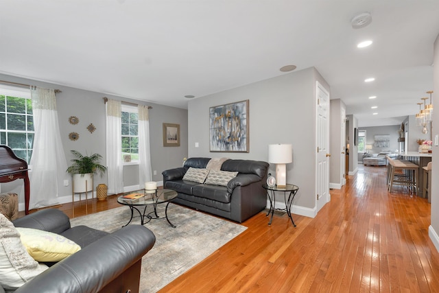12 Julia Dr, Hooksett, NH 03106 - living area with light wood finished floors and recessed lighting