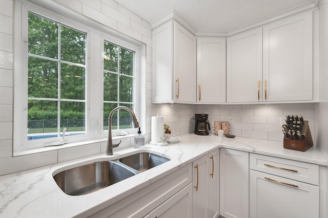 12 Julia Dr, Hooksett, NH 03106 - kitchen featuring healthy amount of natural light, white cabinets, and backsplash