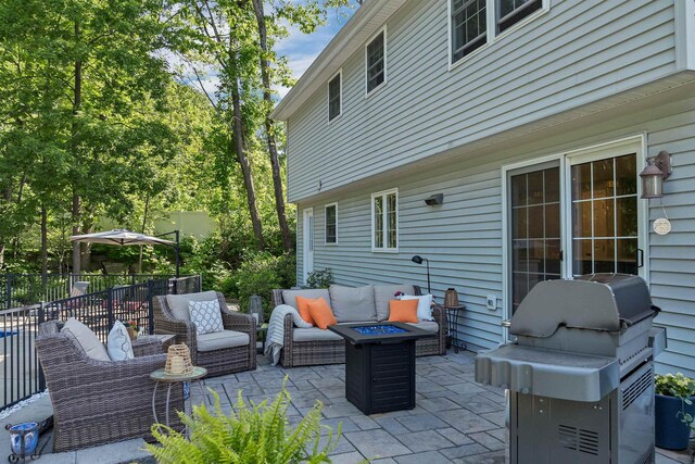 12 Julia Dr, Hooksett, NH 03106 - view of patio / terrace featuring area for grilling and an outdoor living space with a fire pit