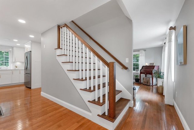 12 Julia Dr, Hooksett, NH 03106 - stairway with plenty of natural light, hardwood / wood-style flooring, and recessed lighting