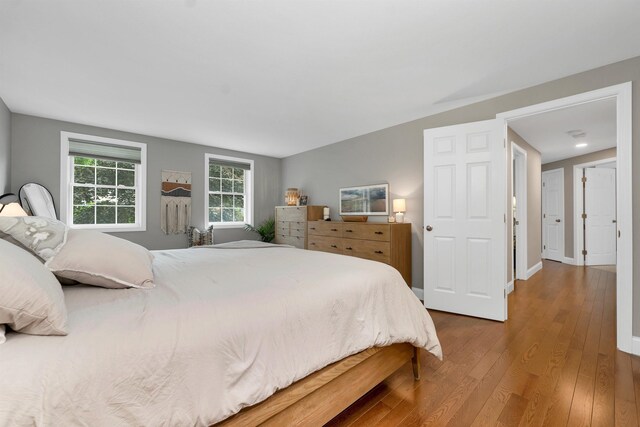 12 Julia Dr, Hooksett, NH 03106 - bedroom with wood finished floors and baseboards