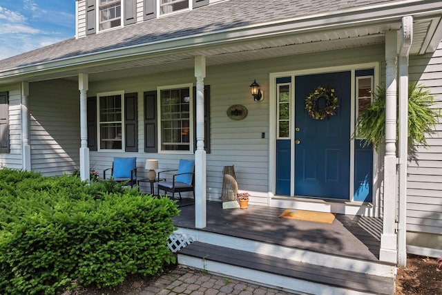 12 Julia Dr, Hooksett, NH 03106 - entrance to property featuring covered porch and roof with shingles