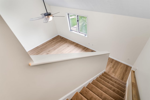 48 Eastmeadow Way, Manchester, NH 03109 - stairs featuring a ceiling fan, wood finished floors, and vaulted ceiling