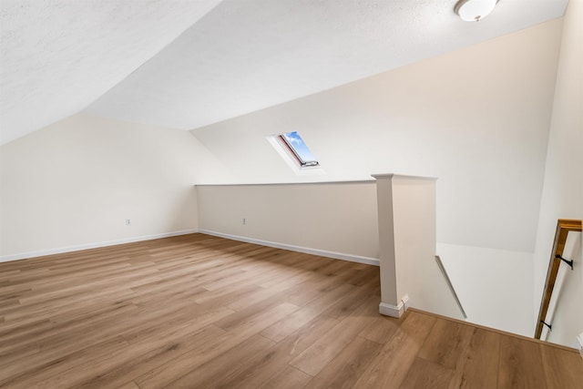 48 Eastmeadow Way, Manchester, NH 03109 - bonus room featuring a skylight, light wood-type flooring, and lofted ceiling