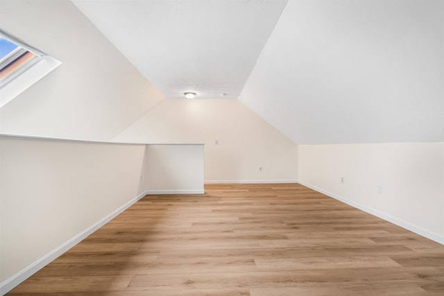 48 Eastmeadow Way, Manchester, NH 03109 - bonus room featuring a skylight, lofted ceiling, and light wood-style floors