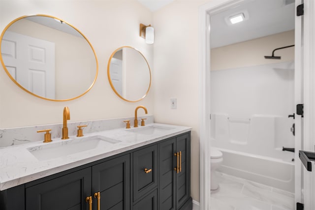 48 Eastmeadow Way, Manchester, NH 03109 - bathroom featuring double vanity, marble look tile flooring, and  shower combination