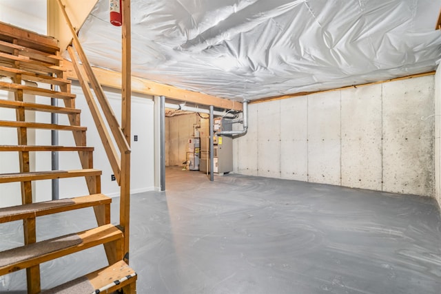 48 Eastmeadow Way, Manchester, NH 03109 - unfinished basement featuring heating unit, stairway, and gas water heater
