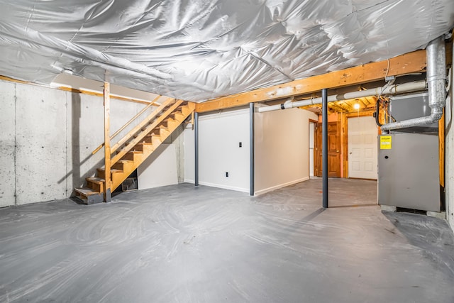 48 Eastmeadow Way, Manchester, NH 03109 - unfinished basement with stairway and heating unit