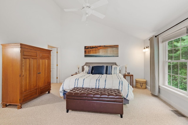 127 Hampton Mdws, Hampton, NH 03842 - bedroom featuring light colored carpet, multiple windows, lofted ceiling, and a ceiling fan