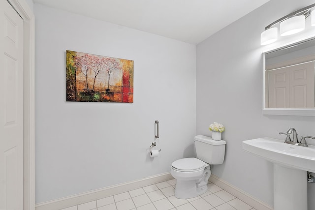 127 Hampton Mdws, Hampton, NH 03842 - bathroom with toilet and tile patterned flooring