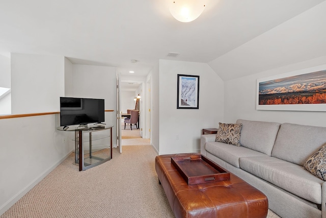 127 Hampton Mdws, Hampton, NH 03842 - living room featuring light colored carpet and vaulted ceiling