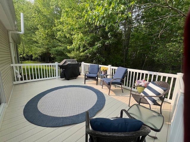 127 Hampton Mdws, Hampton, NH 03842 - wooden deck with area for grilling