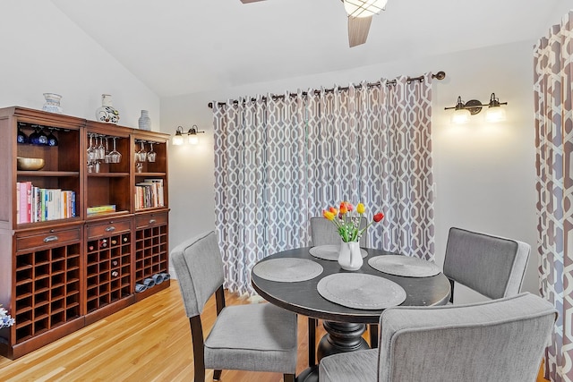 127 Hampton Mdws, Hampton, NH 03842 - dining space featuring light wood-type flooring and lofted ceiling