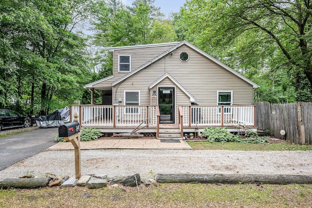 84 Chester Rd, Derry, NH 03038 - view of front facade featuring a deck