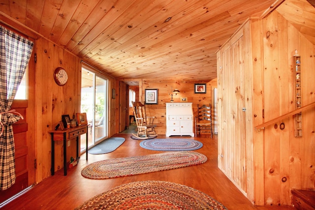 491 The Ln, Peacham, VT 05862 - living area with wooden walls, wood finished floors, and wooden ceiling