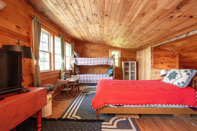 491 The Ln, Peacham, VT 05862 - bedroom featuring wood walls, vaulted ceiling, hardwood / wood-style flooring, and wood ceiling