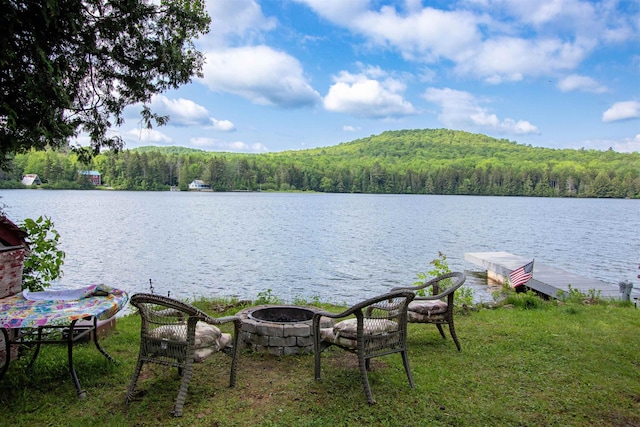 491 The Ln, Peacham, VT 05862 - water view featuring an outdoor fire pit and a boat dock