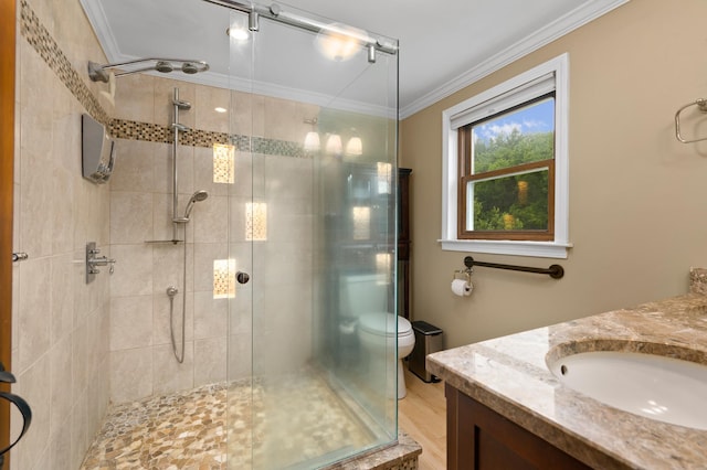 90 Giles Rd, East Kingston, NH 03827 - full bathroom featuring vanity, a shower stall, ornamental molding, and wood finished floors