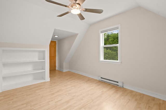 90 Giles Rd, East Kingston, NH 03827 - bonus room featuring a baseboard radiator, lofted ceiling, light wood finished floors, built in features, and a ceiling fan