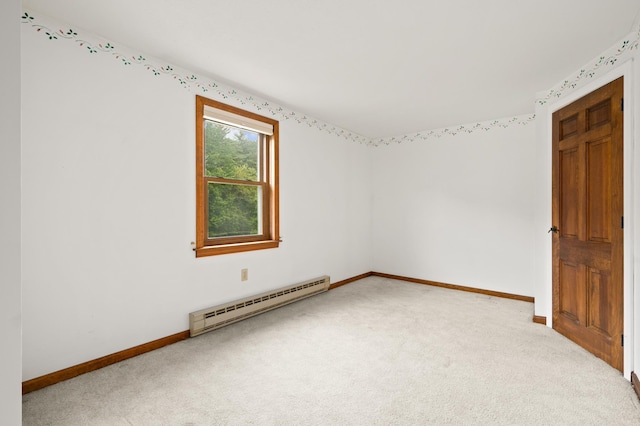 90 Giles Rd, East Kingston, NH 03827 - spare room with baseboard heating and light colored carpet