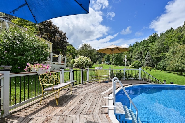 90 Giles Rd, East Kingston, NH 03827 - outdoor pool featuring a wooden deck and a lawn